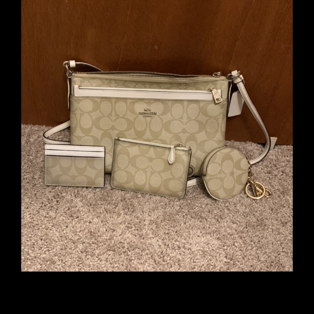 Coach purse with matching wallets.